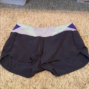 Lululemon grey shorts with colorful waste band